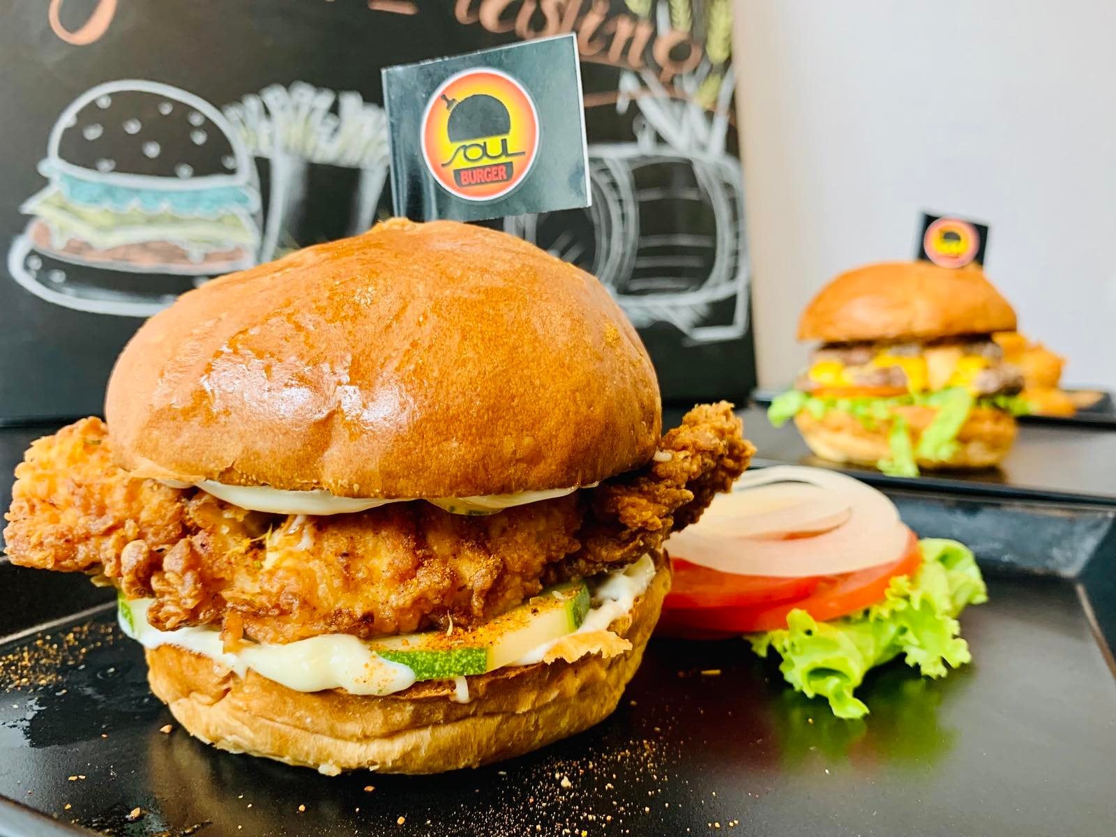 Large American-style burgers with diverse fillings make for a satisfying and filling meal